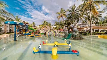 Enjoy a fun-filled day at our tropical water play area, featuring a seesaw, water slide, and pool with a fountain.