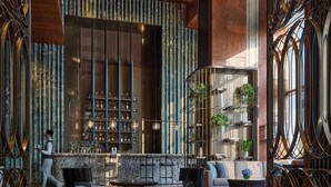 A modern interior with a bar area, seating, and decorative elements. - InterContinental Haikou Seaview by IHG (Haikou)