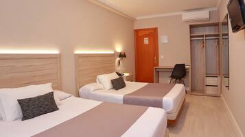 Twin Room | Desk, blackout drapes, free cribs/infant beds, rollaway beds