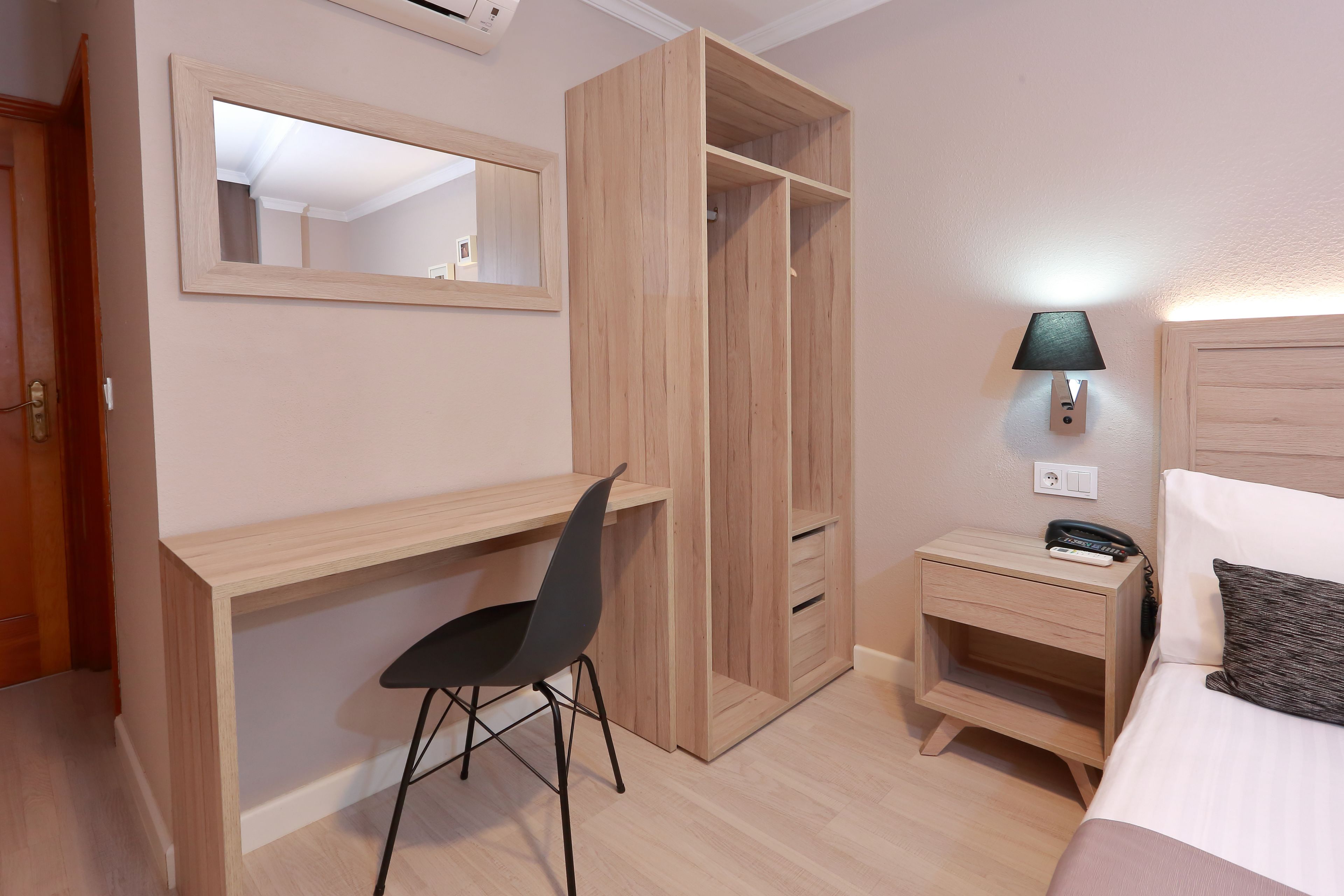 single room | desk, blackout curtains, free cots/infant beds, rollaway beds