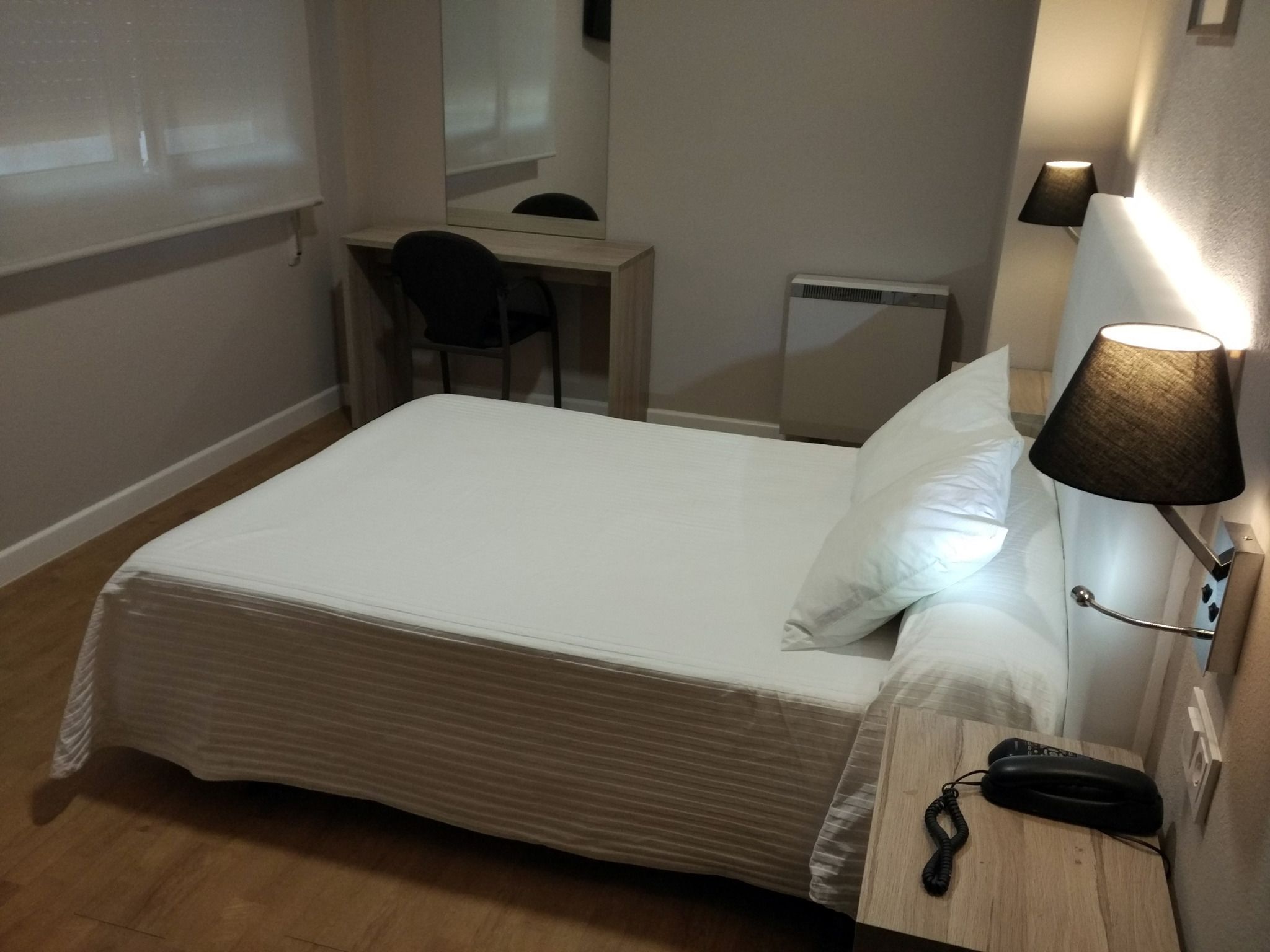 desk, blackout curtains, free cots/infant beds, rollaway beds