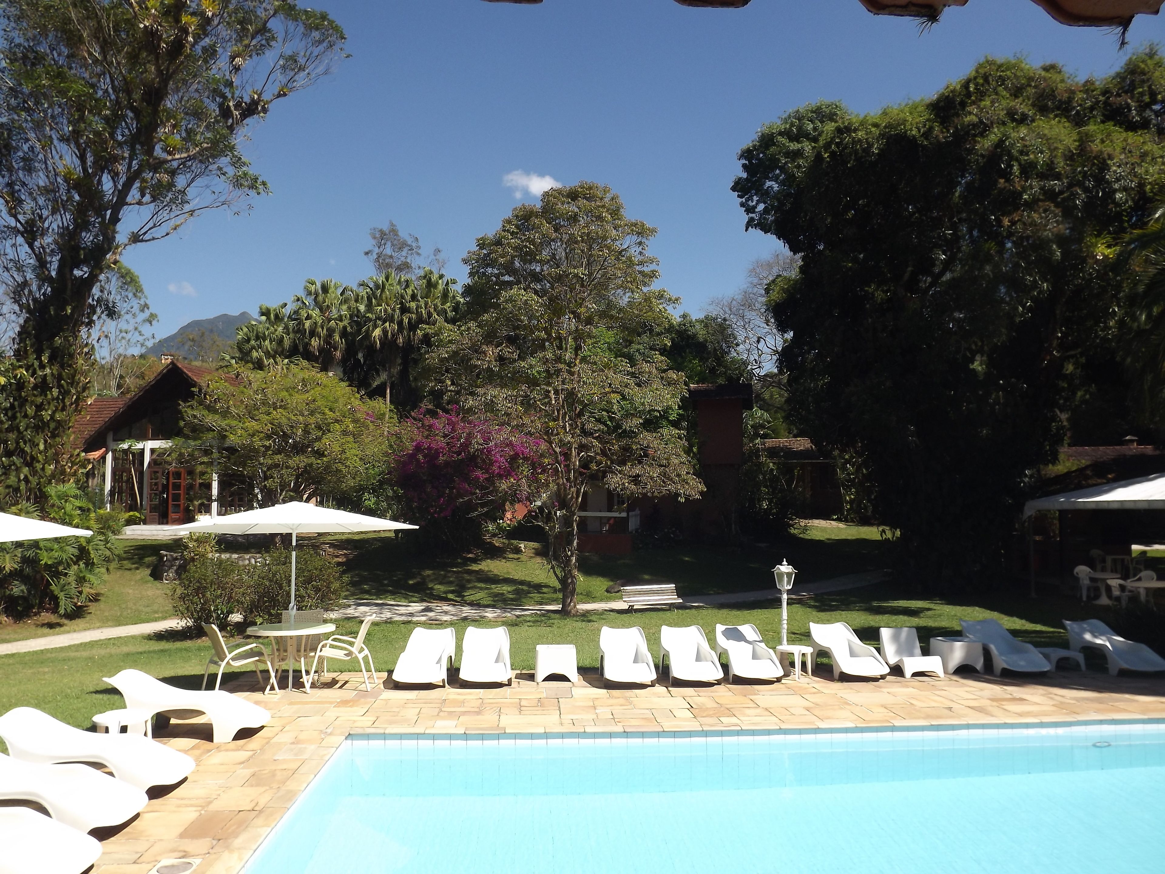 indoor pool, outdoor pool, pool umbrellas, pool loungers