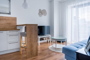 Apartment, 1 Bedroom, Balcony | Living area | Flat-screen TV - Charming & Cozy Ambiente Apartments (Bratislava)