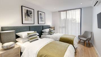 2 bedrooms, premium bedding, pillowtop beds, desk