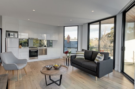 Superior One Bedroom Apartment | Living area | 42-inch flat-screen TV with digital channels, TV, iPod dock