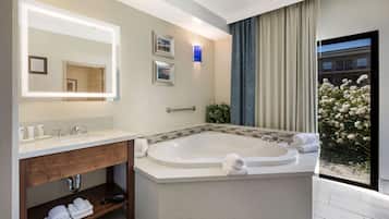Suite, 1 King Bed, Non Smoking, Jetted Tub | 1 bedroom, in-room safe, desk, iron/ironing board