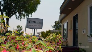 A sign for Wittle Inn with a clear view of the building's exterior. - Wittle Inn (Sunnyvale)