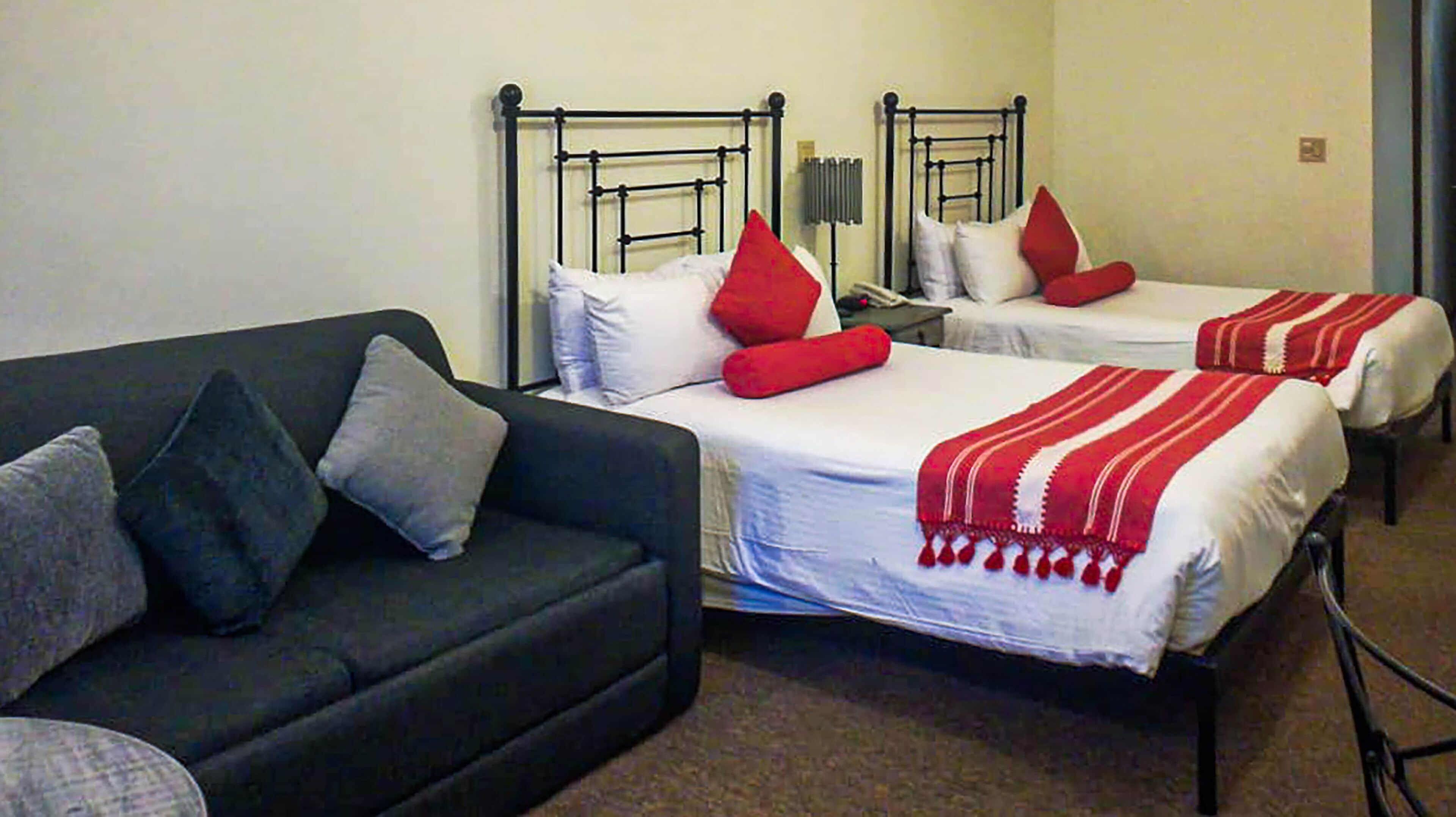 Junior Double Room | Living room | Flat-screen TV