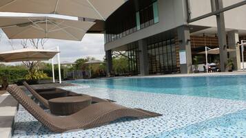 Outdoor pool, open 8:00 AM to 9:00 PM, sun loungers