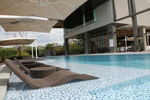 Outdoor pool, open 8:00 AM to 9:00 PM, sun loungers