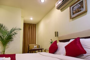 Premium bedding, desk, iron/ironing board, rollaway beds