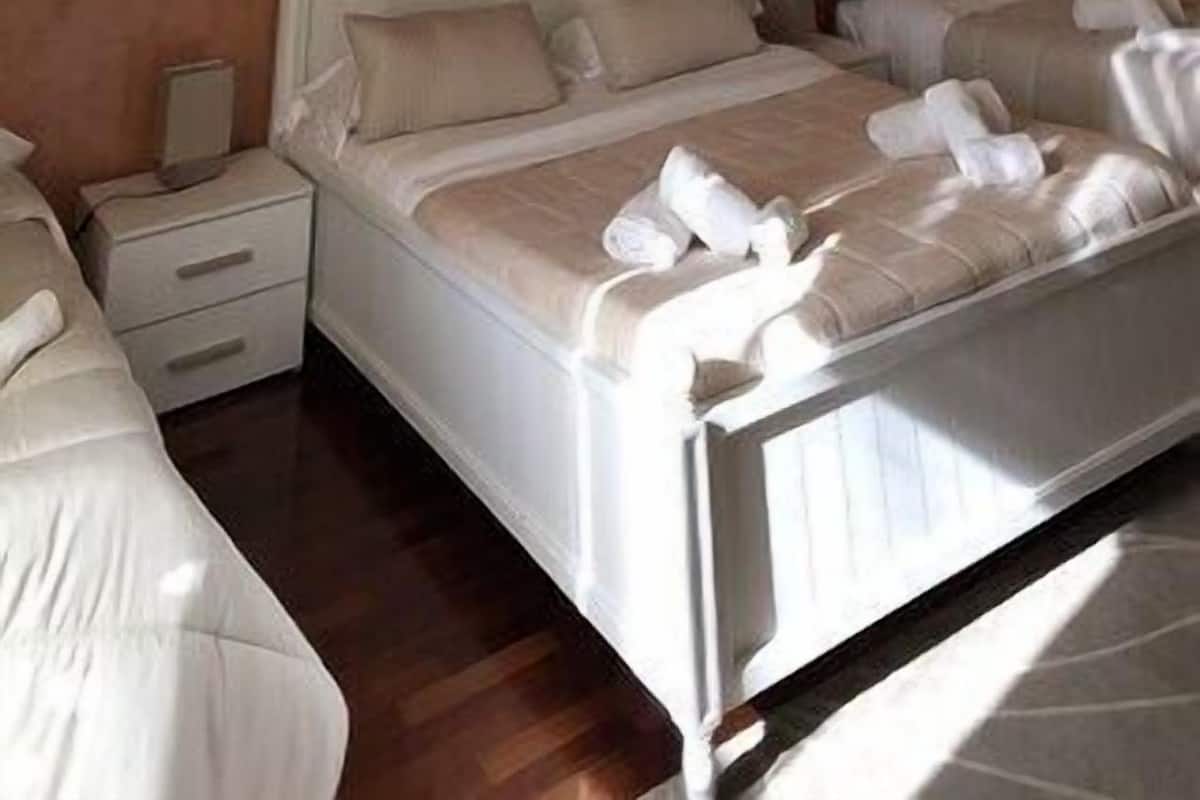 Premium bedding, down duvets, in-room safe, desk