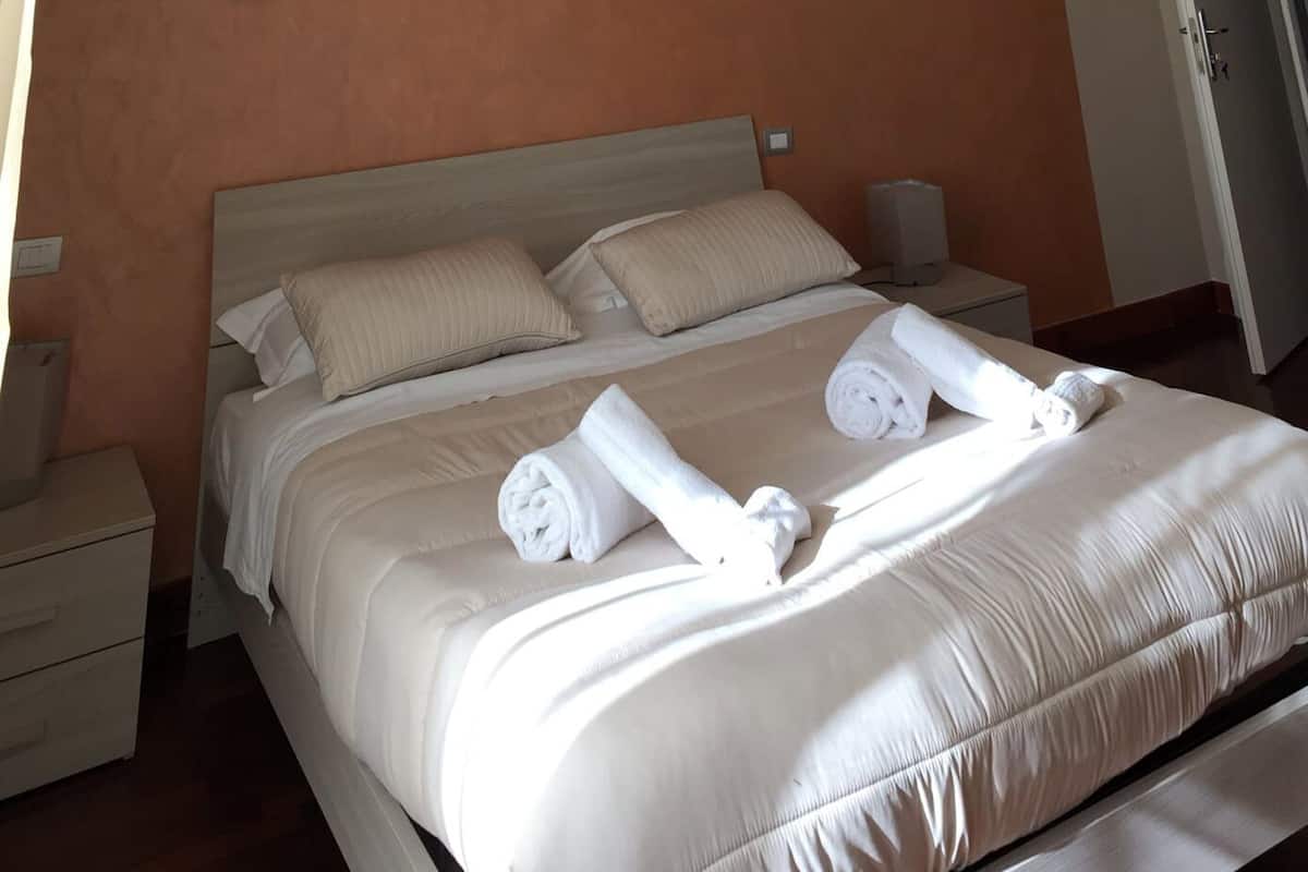 Premium bedding, down duvets, in-room safe, desk
