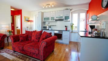Comfort Apartment, 2 Bedrooms, Terrace | Living room | 60-cm flat-screen TV with satellite channels, TV