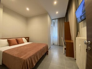 Habitación estándar con 1 cama matrimonial o 2 individuales | Ropa de cama de alta calidad, edredón y camas con efecto memoria 