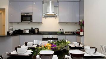 Luxury Apartment, 2 Bedrooms, Ground Floor | Private kitchen | Full-size fridge, microwave, stovetop, dishwasher