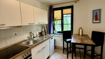 Comfort Condo, 1 Bedroom, Balcony, Garden Area (Wohnung 2) | Private kitchen | Full-sized fridge, microwave, stovetop, dishwasher