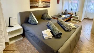 Comfort Condo, 1 Bedroom, Balcony, Garden Area (Wohnung 2) | Living area | 24-inch LCD TV with satellite channels, TV, DVD player