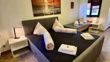 Comfort Condo, 1 Bedroom, Balcony, Garden Area (Wohnung 2) | Desk, laptop workspace, blackout drapes, soundproofing