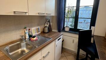 Comfort Condo, 1 Bedroom, Balcony, Garden Area (Wohnung 2) | Private kitchen | Full-size fridge, microwave, stovetop, dishwasher