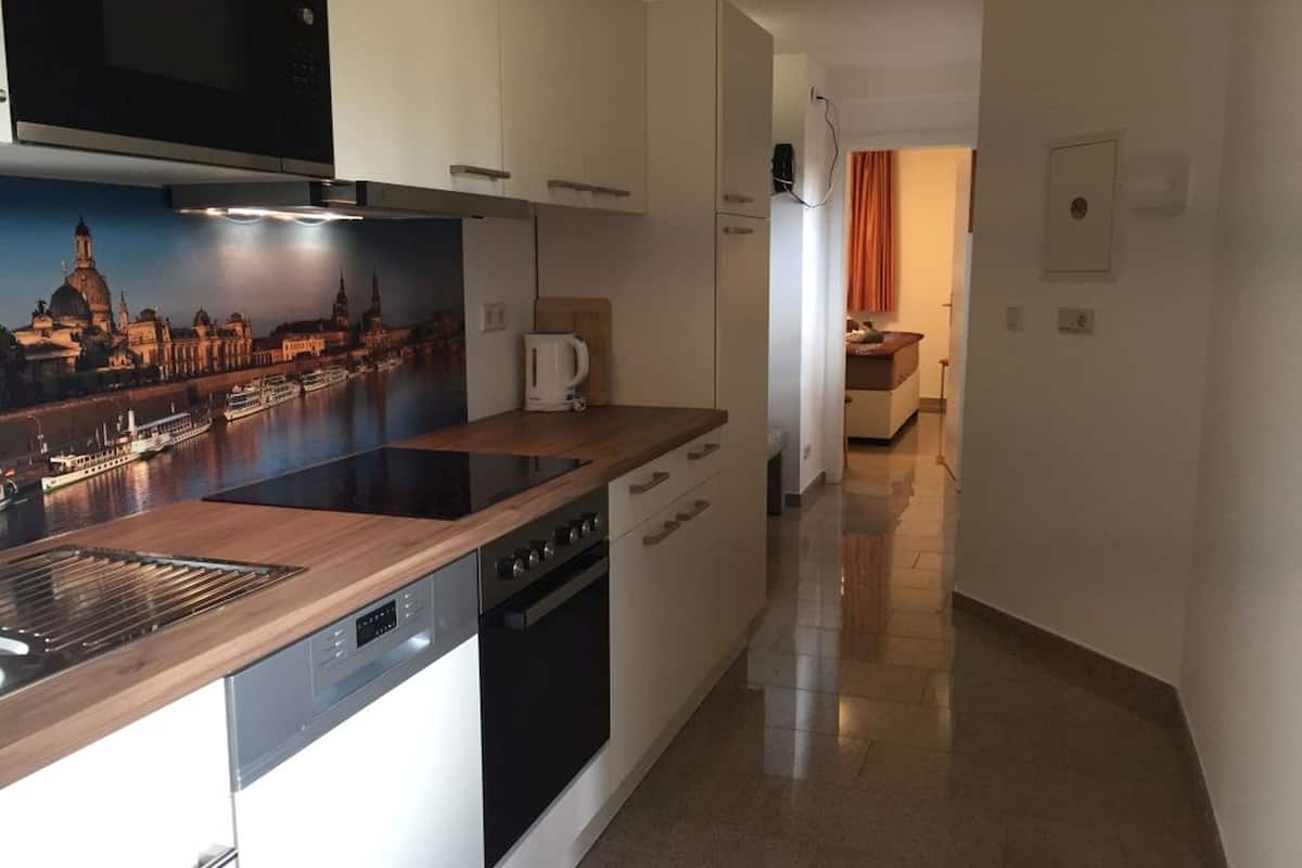 Apartment, 3 Bedrooms, Kitchen (Wohnung 1) | Private kitchen | Full-sized fridge, microwave, stovetop, dishwasher