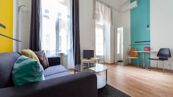 Premium bedding, laptop workspace, blackout curtains, iron/ironing board