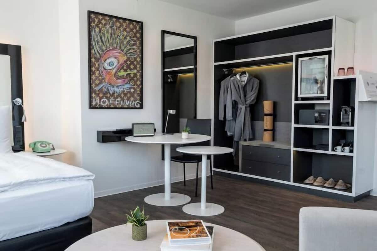 Premium bedding, free minibar, in-room safe, desk