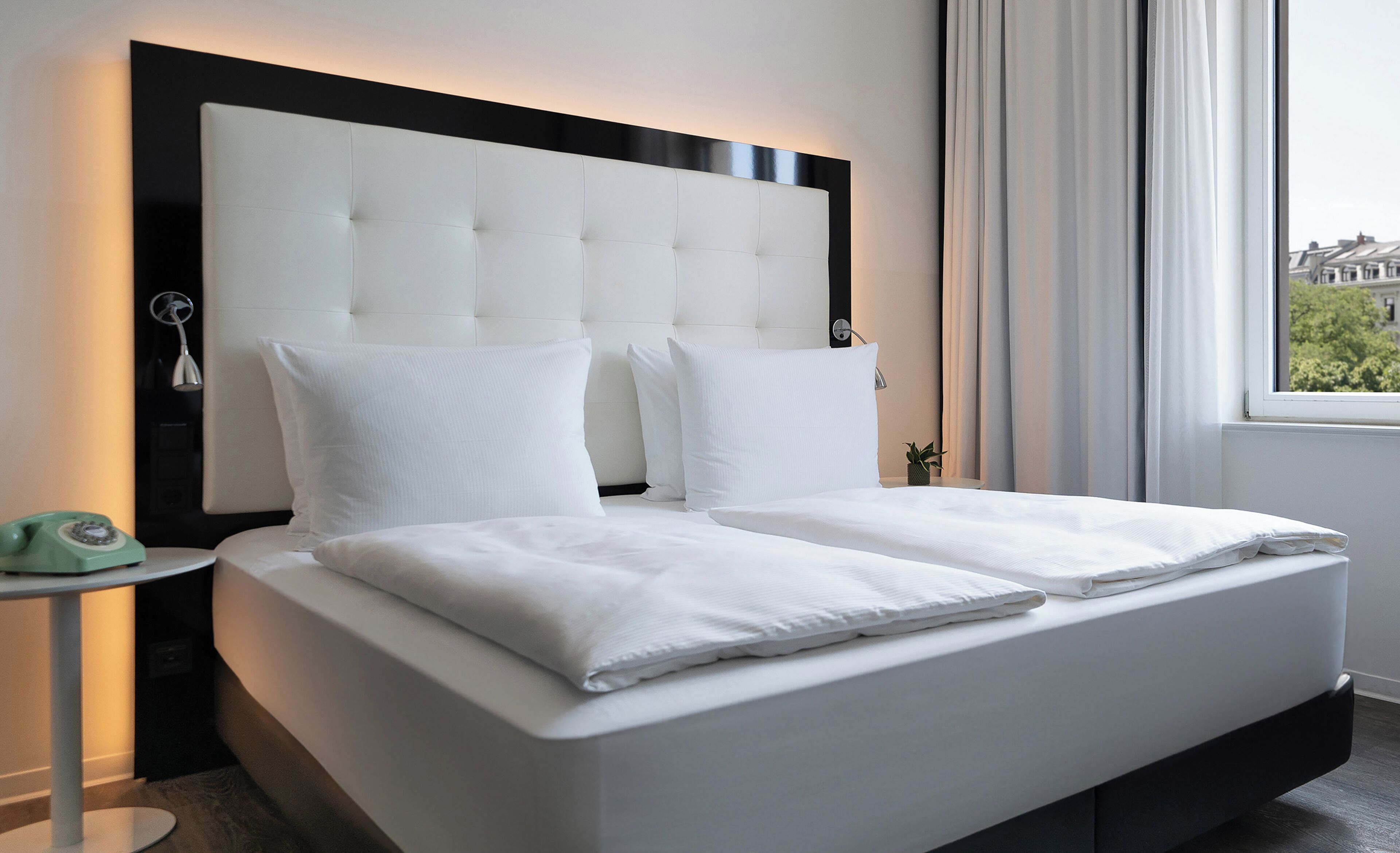 Literie de qualité supérieure, articles gratuits dans le mini-bar