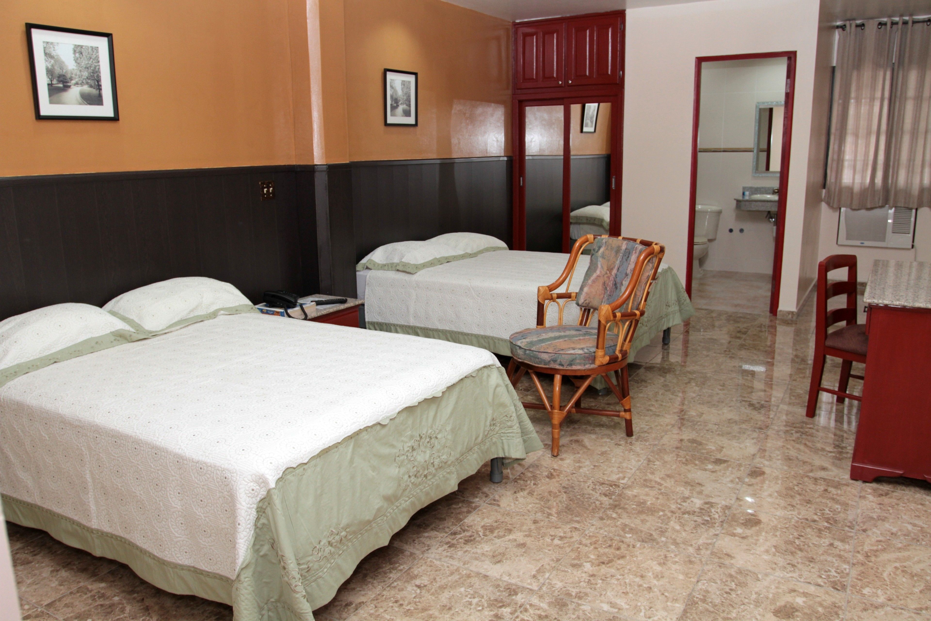 double room, 2 double beds | in-room safe, desk, iron/ironing board, free wifi