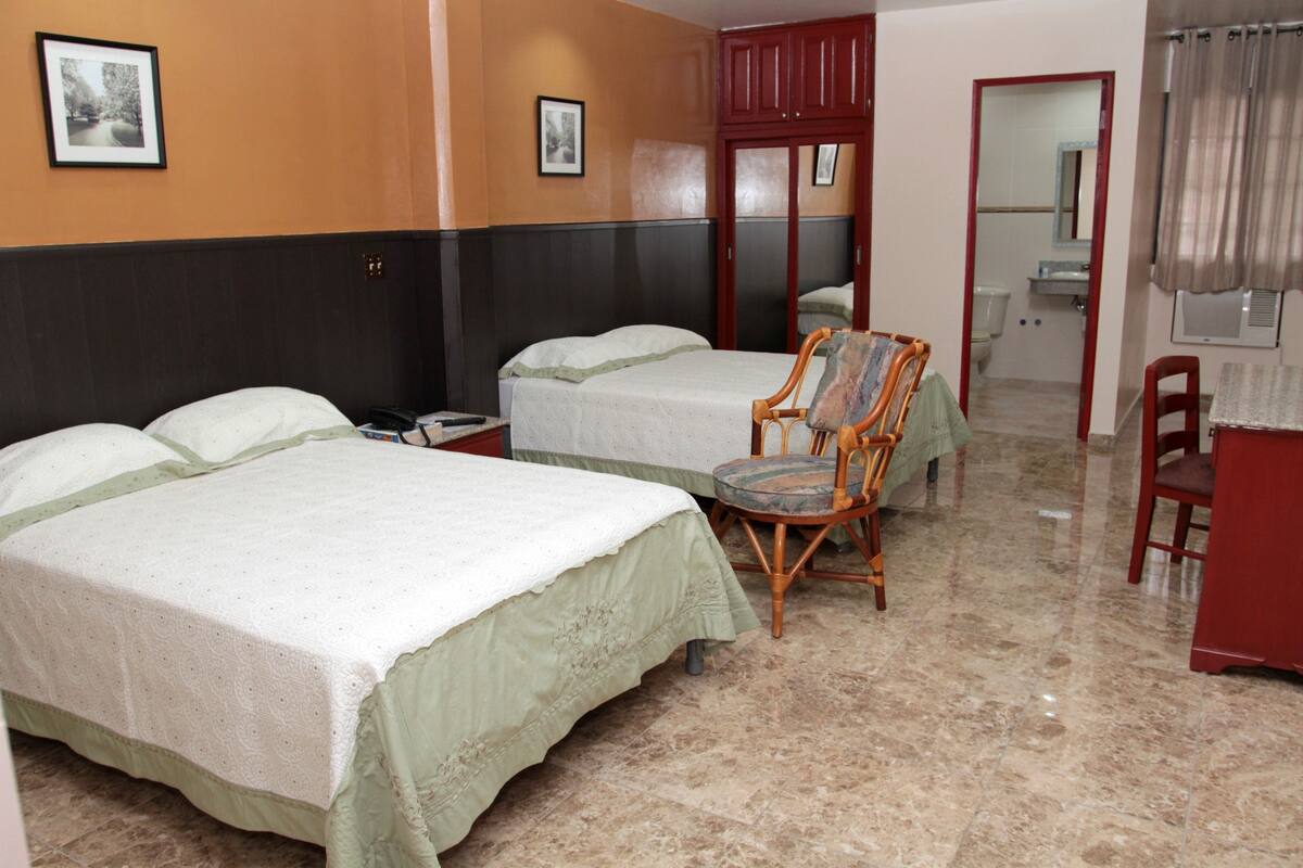 double room, 2 double beds | in-room safe, desk, iron/ironing board, free wifi