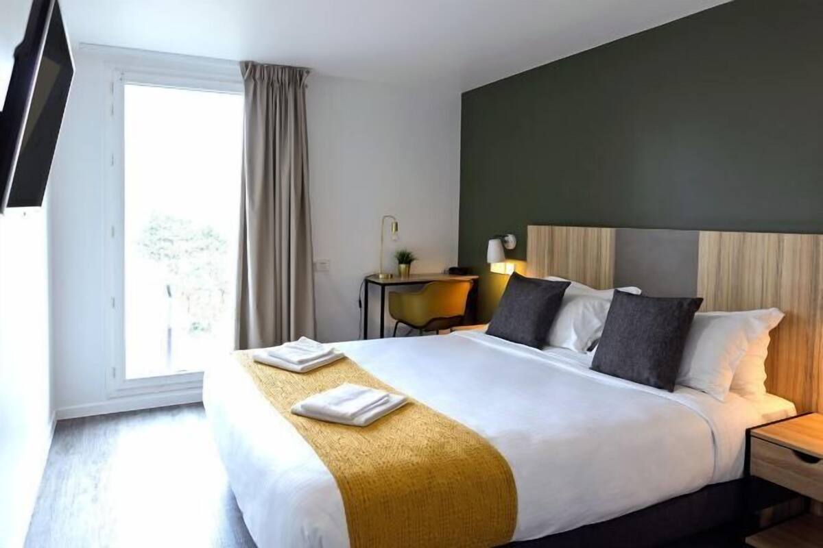 Premium bedding, laptop workspace, soundproofing