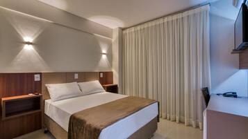 Quarto executivo, 1 cama de casal | Frigobar, escrivaninha, quartos à prova de som, Wi-Fi de cortesia