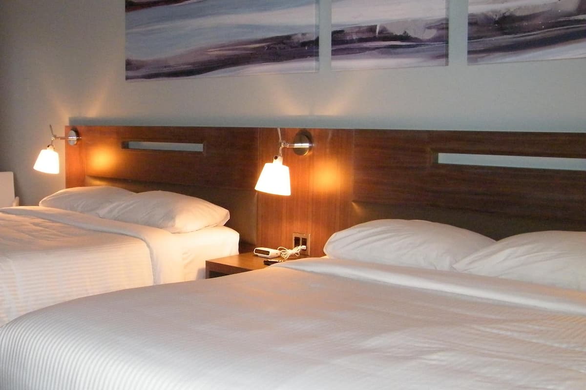 room, 2 double beds | premium bedding, desk, iron/ironing board, free wifi