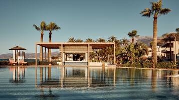 2 outdoor pools, pool umbrellas, sun loungers