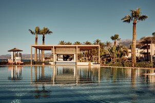 2 outdoor pools, pool umbrellas, sun loungers