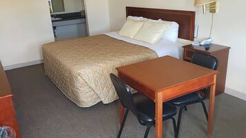 Standard Room, 1 King Bed, Non Smoking | Blackout drapes, iron/ironing board, free rollaway beds, free WiFi