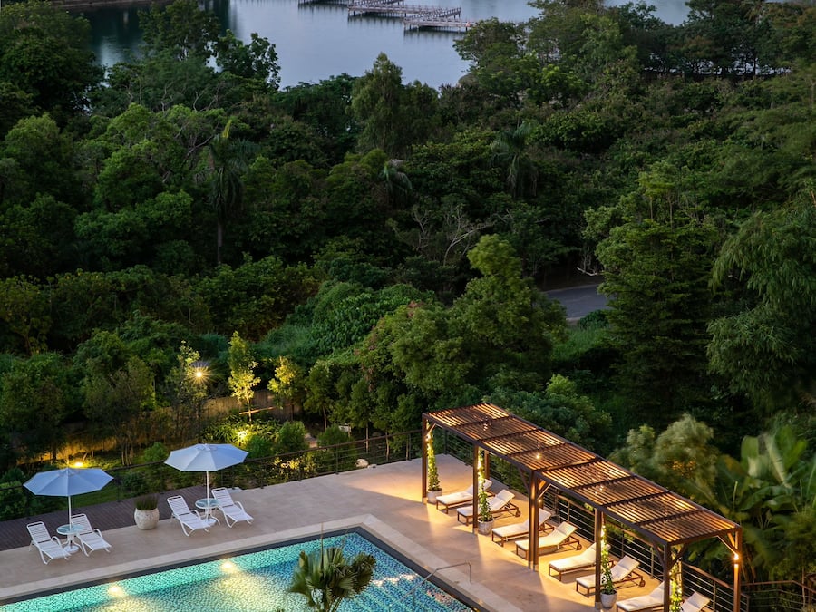 Outdoor pool, open 3:00 PM to 7:00 PM, pool umbrellas, pool loungers