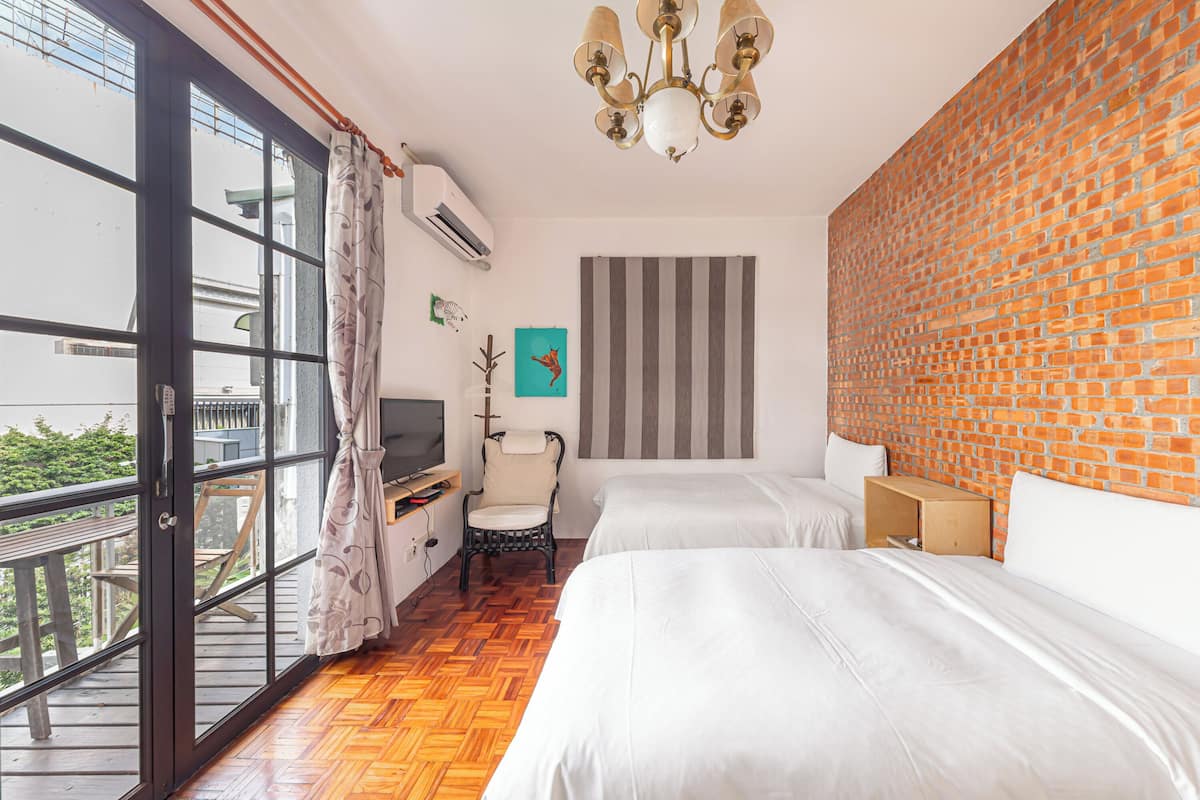 Kamar Twin, balkon, area halaman | 1 kamar tidur dan selimut bulu angsa