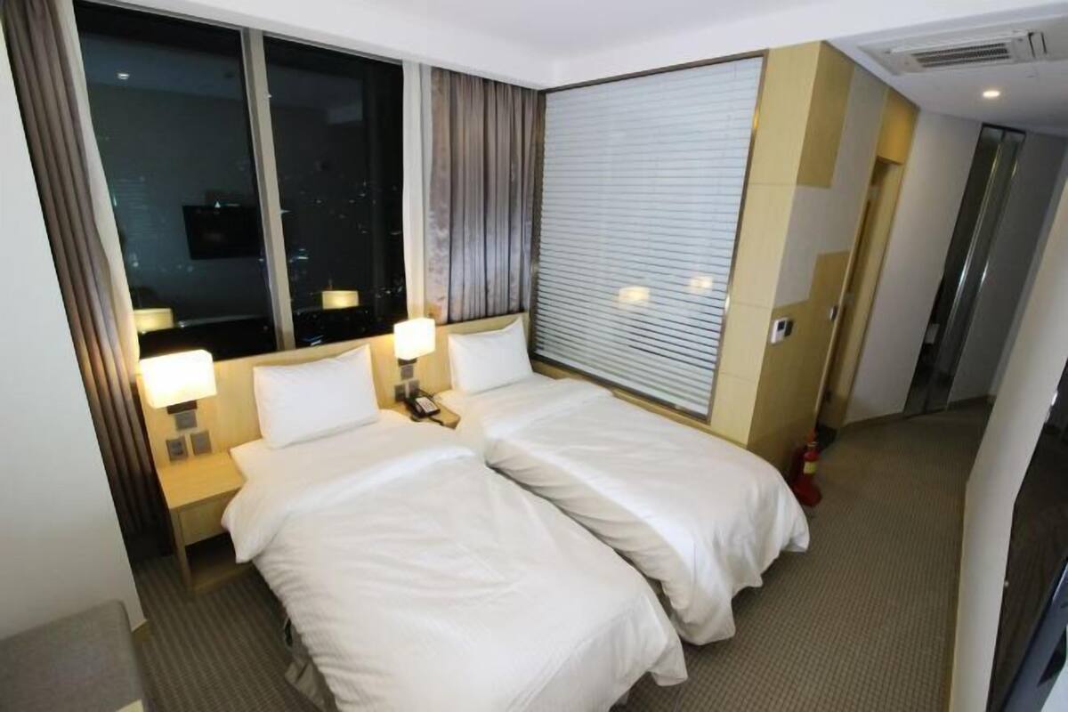 Premium bedding, down duvets, in-room safe, desk