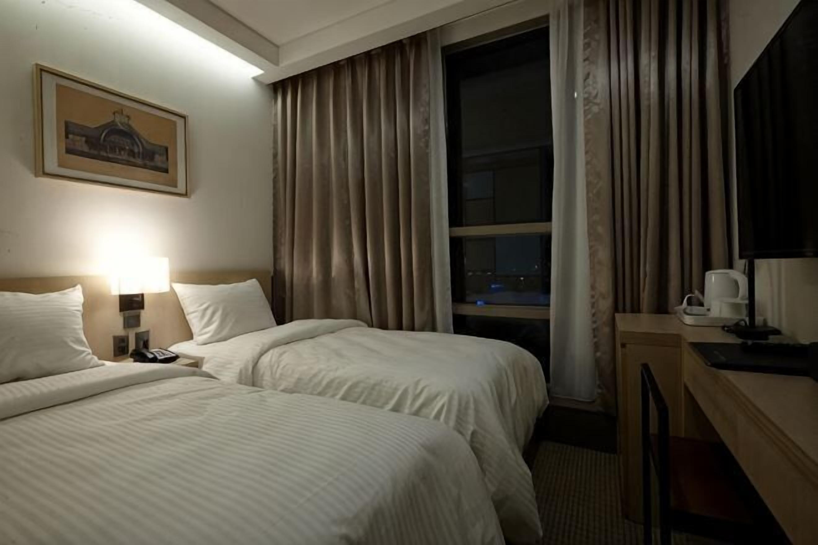 Premium bedding, down duvets, in-room safe, desk