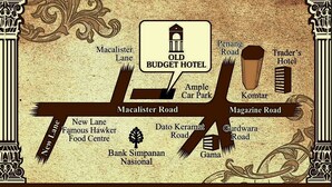 A stylized map of a town with landmarks like Old Budget Hotel, Macalister Lane, and New Lane. - Old Budget Hotel (George Town)