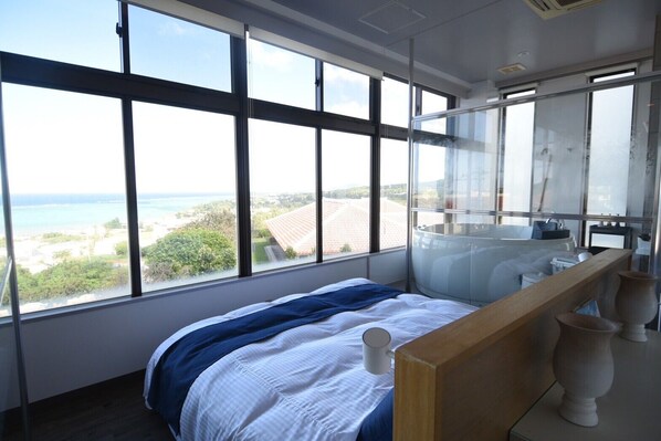 Suite Deluxe, vista al océano (2F R005) | Wifi gratis y ropa de cama 