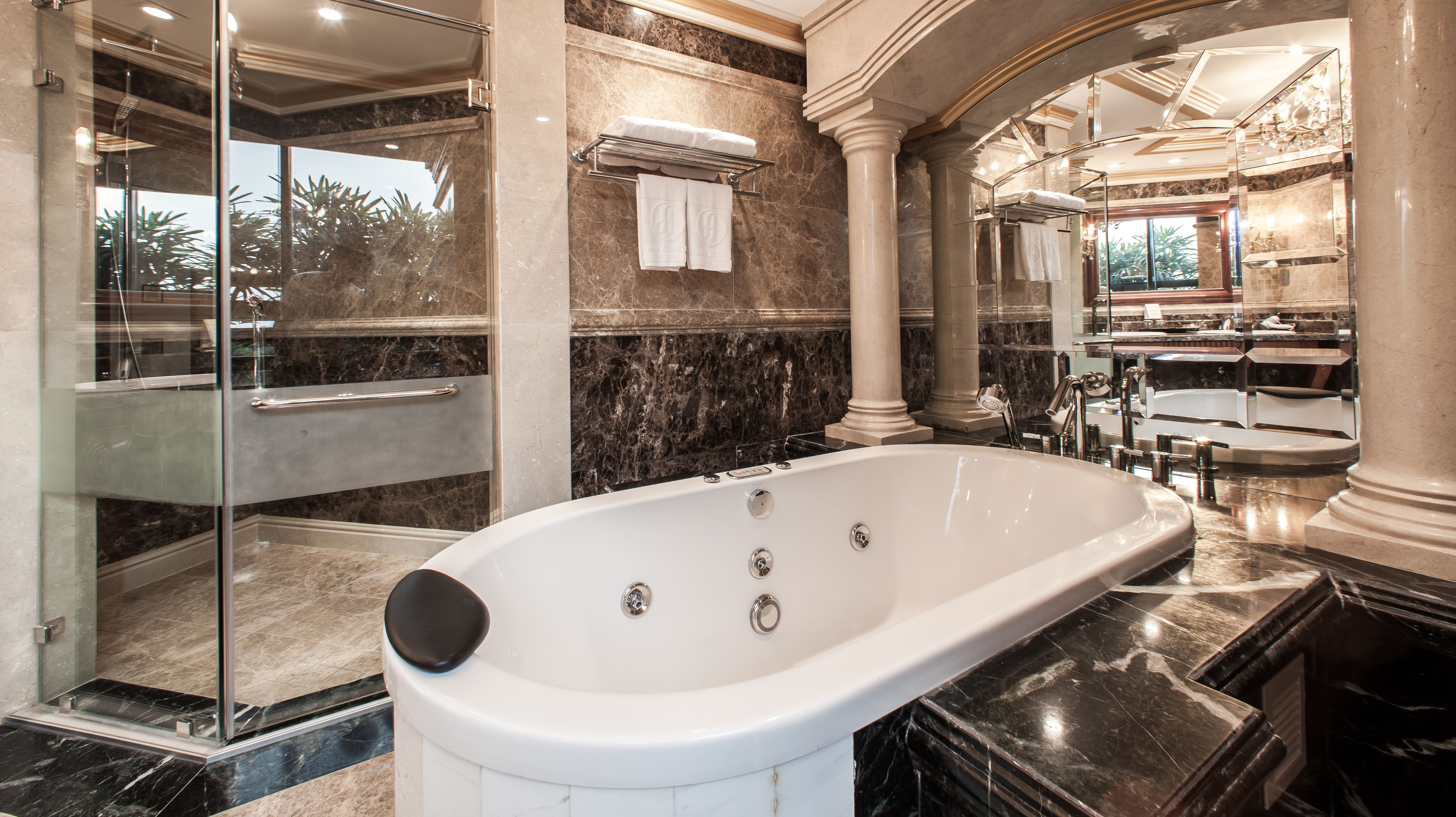 presidential suite | bathroom | combined shower/bathtub, designer toiletries, hair dryer, slippers