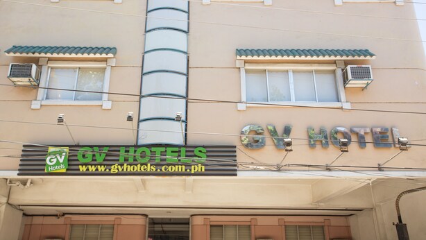A hotel building with a sign reading "GV Hotels" and a website address. - GV Hotel Masbate (Masbate City)