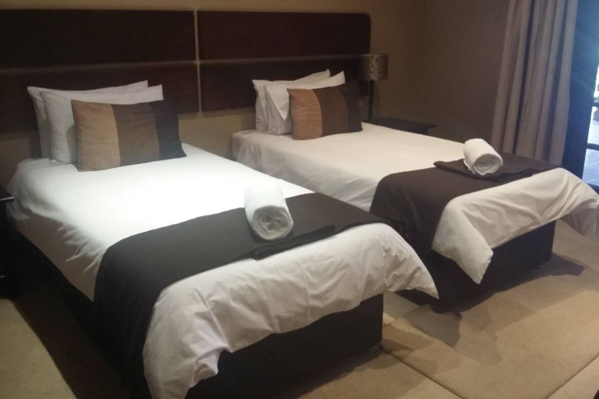 Luxury Room | Premium bedding, desk, free WiFi