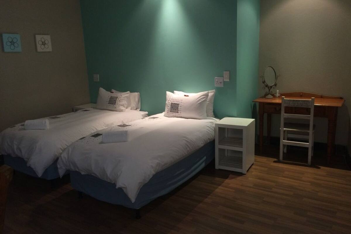 Family Room | Premium bedding, desk, free WiFi
