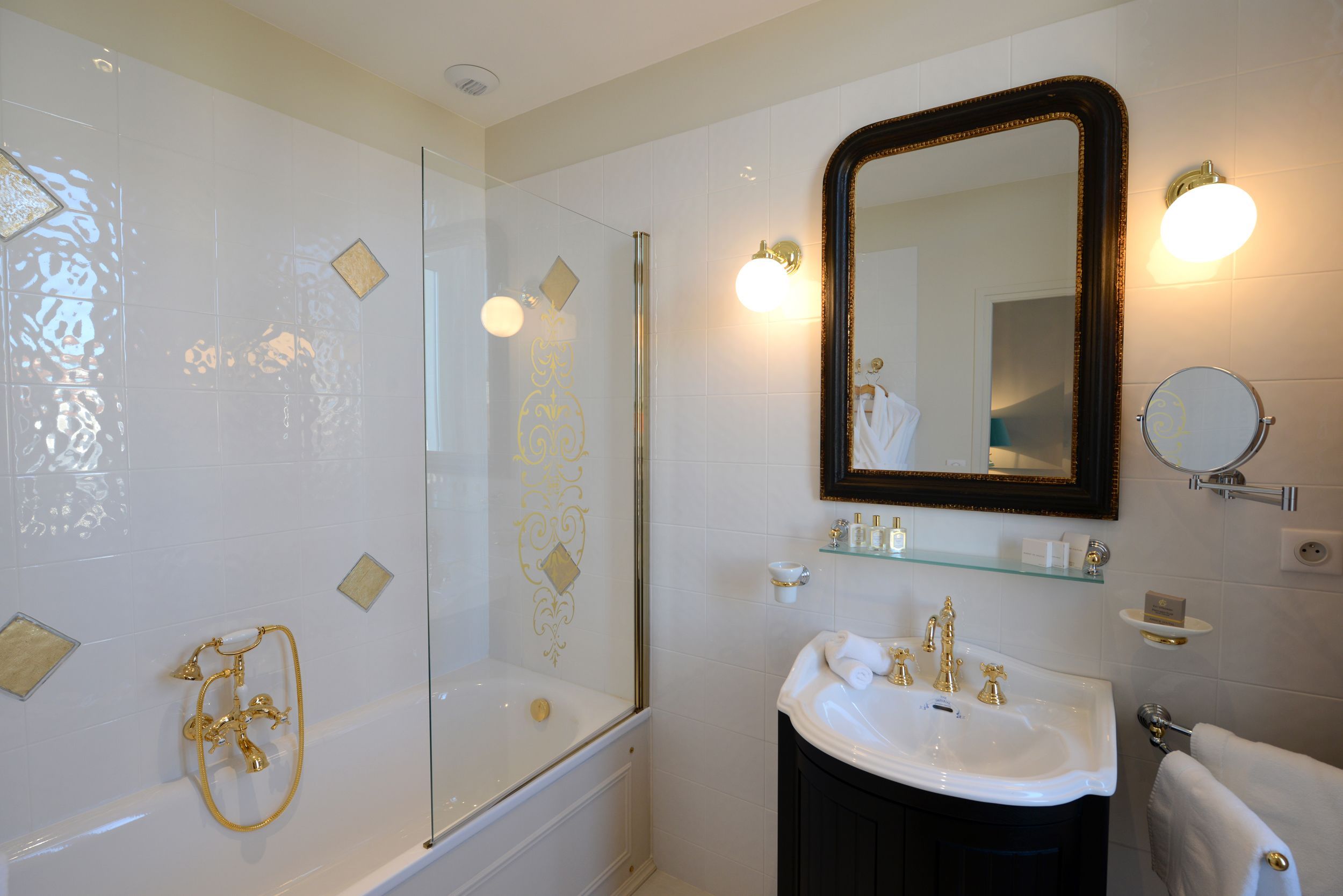 junior suite | bathroom | designer toiletries, hair dryer, bathrobes, towels