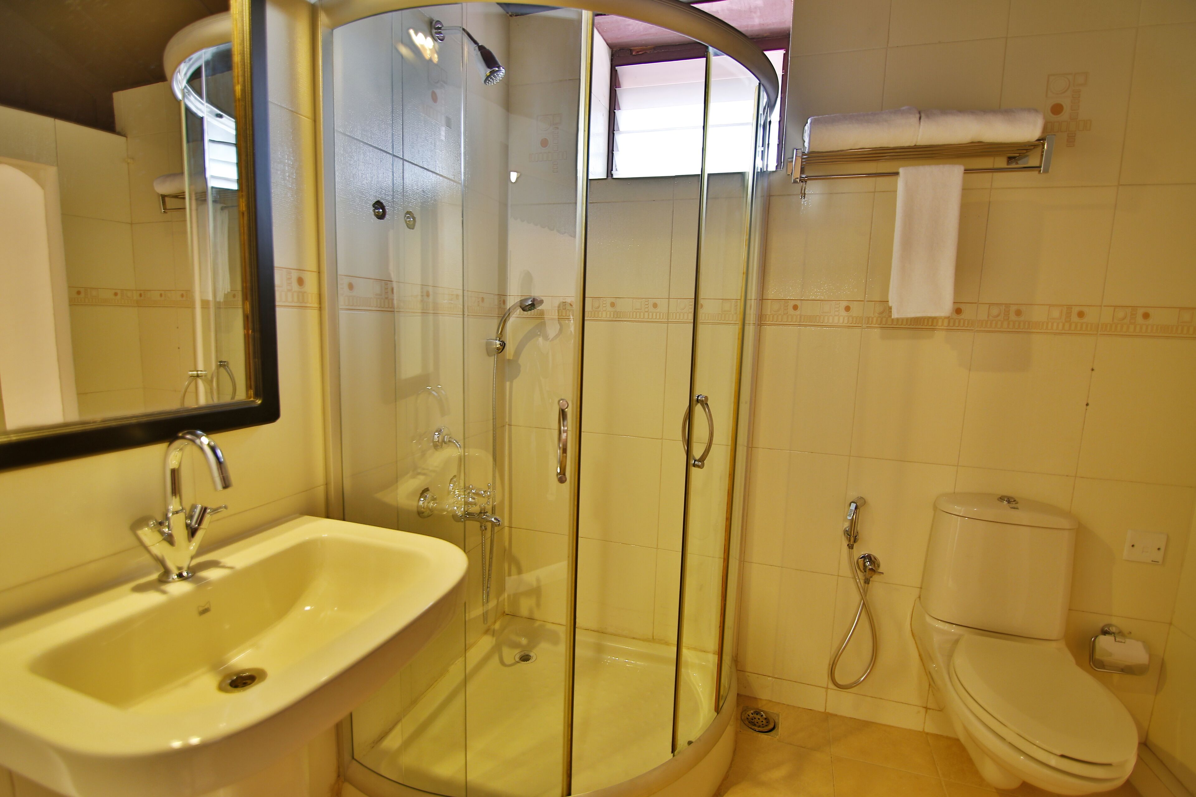 shower, free toiletries, hair dryer, towels