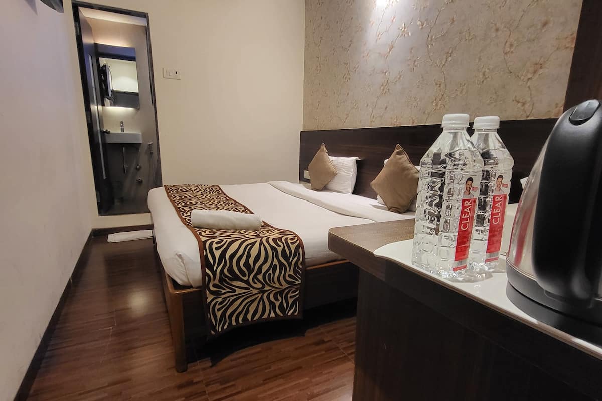 ห้องสแตนดาร์ด, เตียงเดี่ยว 1 เตียง, ปลอดบุหรี่, ชั้นล่าง | 1 ห้องนอน, ผ้าปูที่นอนฝ้ายอียิปต์, เครื่องนอนระดับพรีเมียม, มินิบาร์