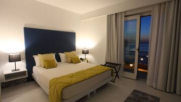 Premium bedding, free minibar items, in-room safe, desk